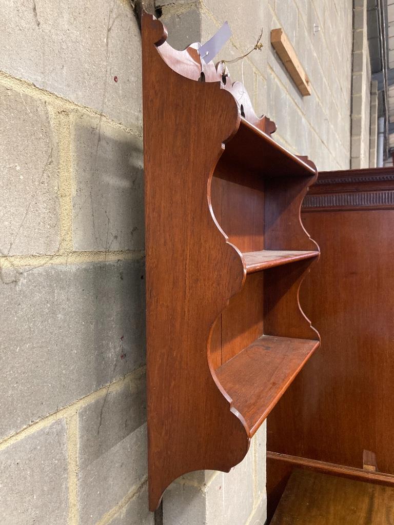 A Victorian oak wall shelf, width 60cm